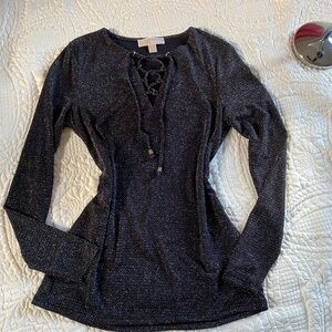 Chic and versatile piece, perfect for dressing up or down.